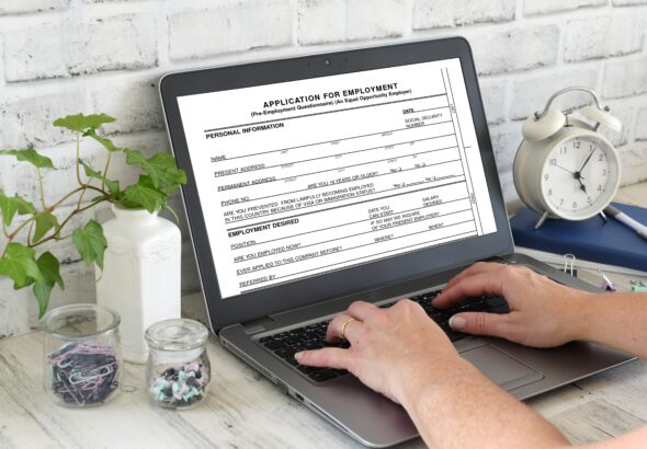 filling-out-an-application-for-employment-online-2023-11-27-05-18-23-utc